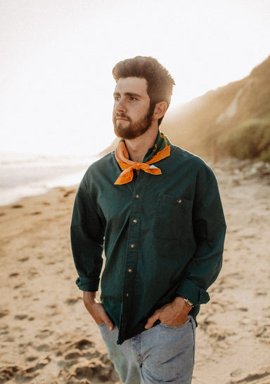 a man standing on a beach