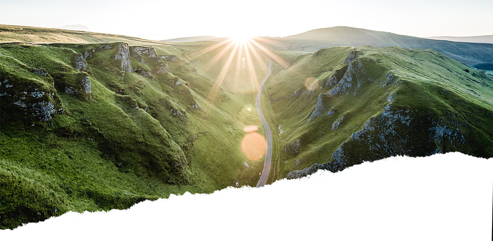 a waterfall in a valley