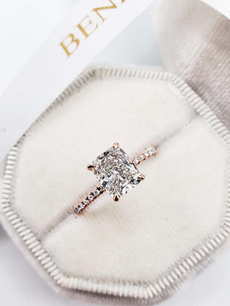 elongated cushion hidden halo engagement ring