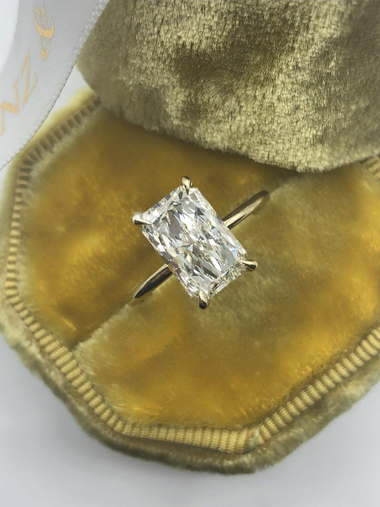 radiant cut hidden halo engagement ring