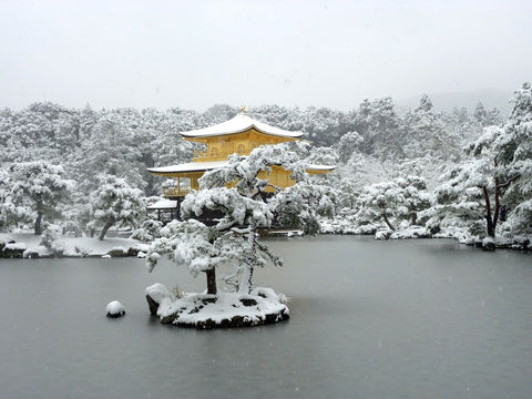 Kinkakuji Temple in winter snow Kyoto Japan