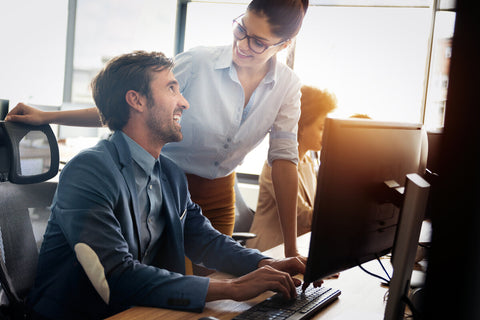 Man and woman in an office desk