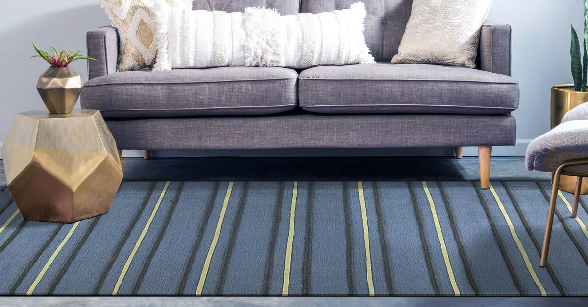 8.For a Seemingly Bigger Room add a Navy Blue Striped Rug