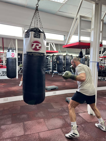 Man punching Ringside punching bag