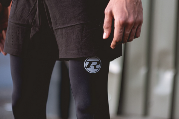 Ringside Logo on leggings being worn by man underneath shorts