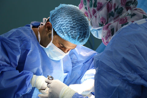 Doctors performing surgery