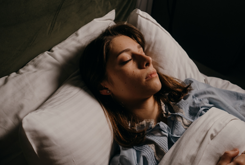 Woman sleeping in bed