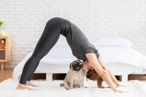 Woman in downward facing dog position