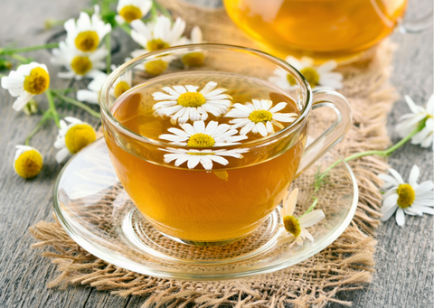 Chamomile tea and flowers.