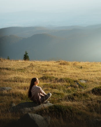 Woman sitting in a field