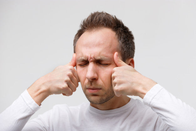 Man suffering from dizziness