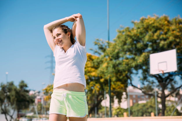 Woman exercising outdoors.