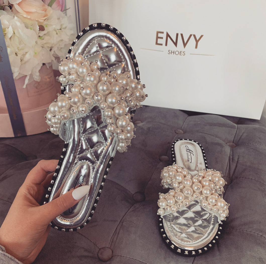 silver and pearl shoes