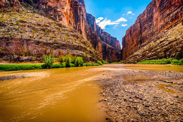 Santa Elena Canyon walls rising high above the muddy Rio Grande River