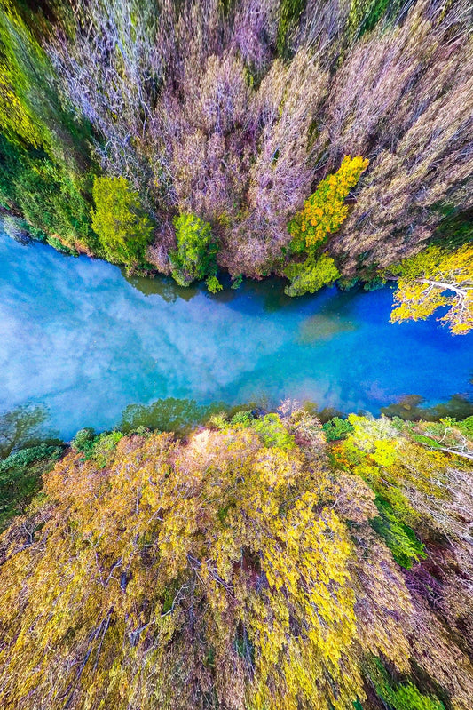 https://cdn.shopify.com/s/files/1/2460/8423/products/wimberley-puzzle-company-artist-signature-series-jigsaw-puzzle-ozarks-cloud-to-ground-an-aerial-view-national-parks-puzzle-250-500-1000-pieces-28910086750293.jpg?v=1643737929&width=533