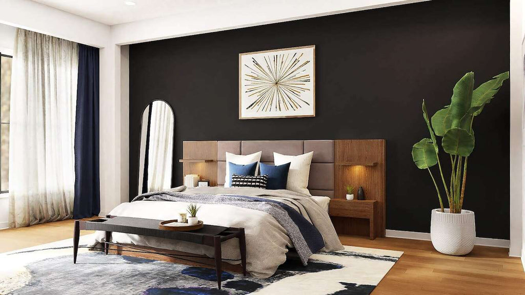 A bedroom with black walls, a large mirror, and a large leafy plant
