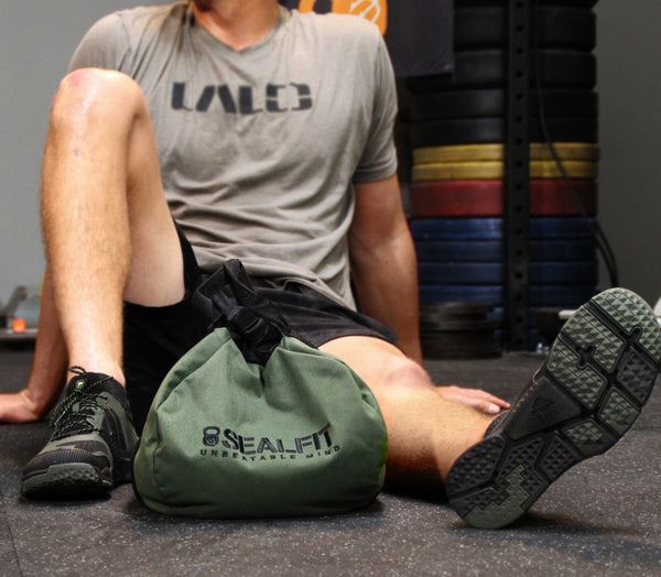 Athletic Footwear and Sandbag Kettlebell in a gym