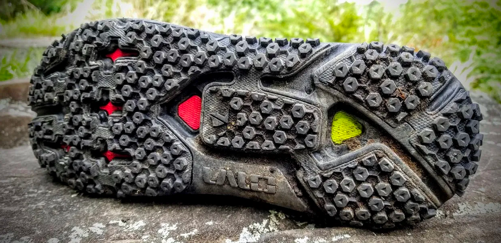 trail running shoe tread and foot shape