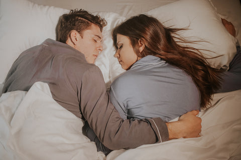 couple sleeping in bed