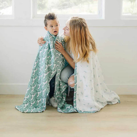 Child and mom in blanket