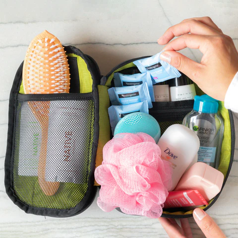 Sherpani travel accessory, the Atlas toiletry case full of travel minis