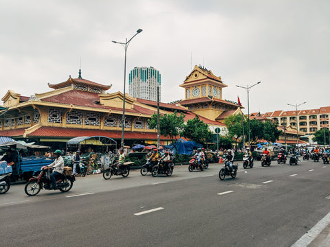 A city view of people on motorbikes in Ho Chi Minh City, Vietnam