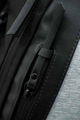 A close up view of the tunnel lock on the external zipper pockets of Sherpani Anti-Theft bags