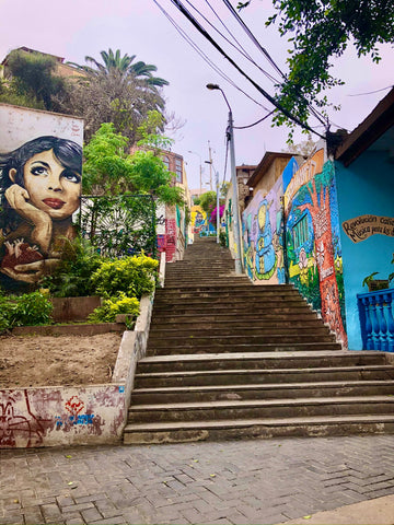 Street murals by a set of stairs in Barranco, Lima