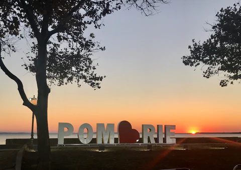 "Pomorie" sign on the water in Pomorie, Bulgaria