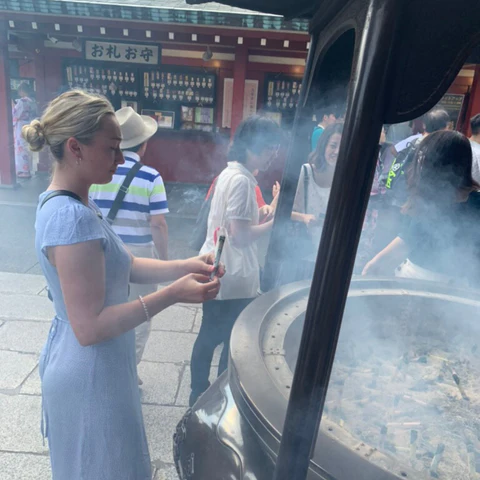 Emma standing in front of the incense burner in Senso-ji Temple, Tokyo