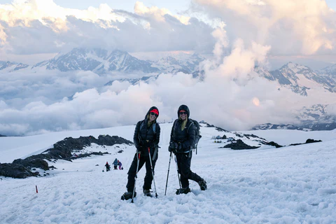 WHOA Travel cofounders Danielle and Allison on their way to a summit