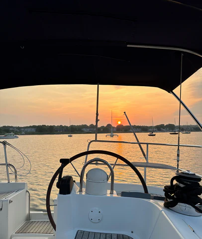 A sunset view from the back of Doni's sailboat Relish