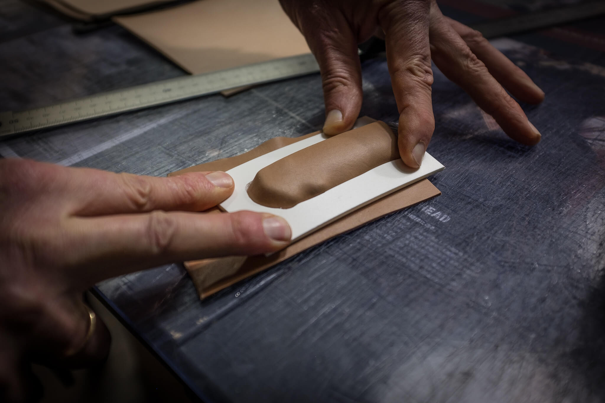 Positioning the soaked leather and the mold | Duke & Sons Leather