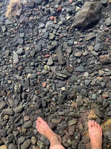 Water shoes are a must have for this rocky beach