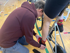 Checking cleat position during bike fit