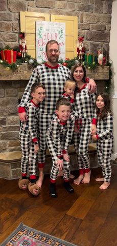 family in matching christmas pjs