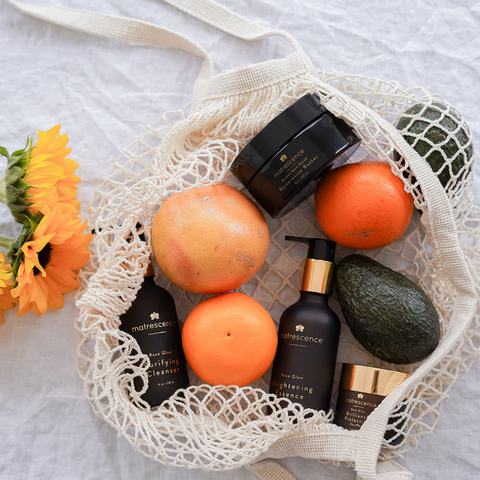 oranges and flowers with skincare