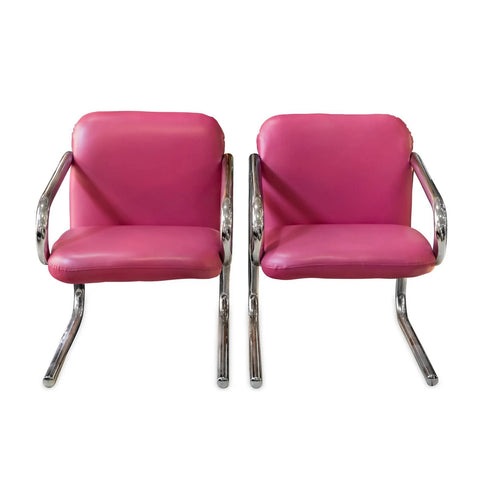 mid century chairs in chrome and pink