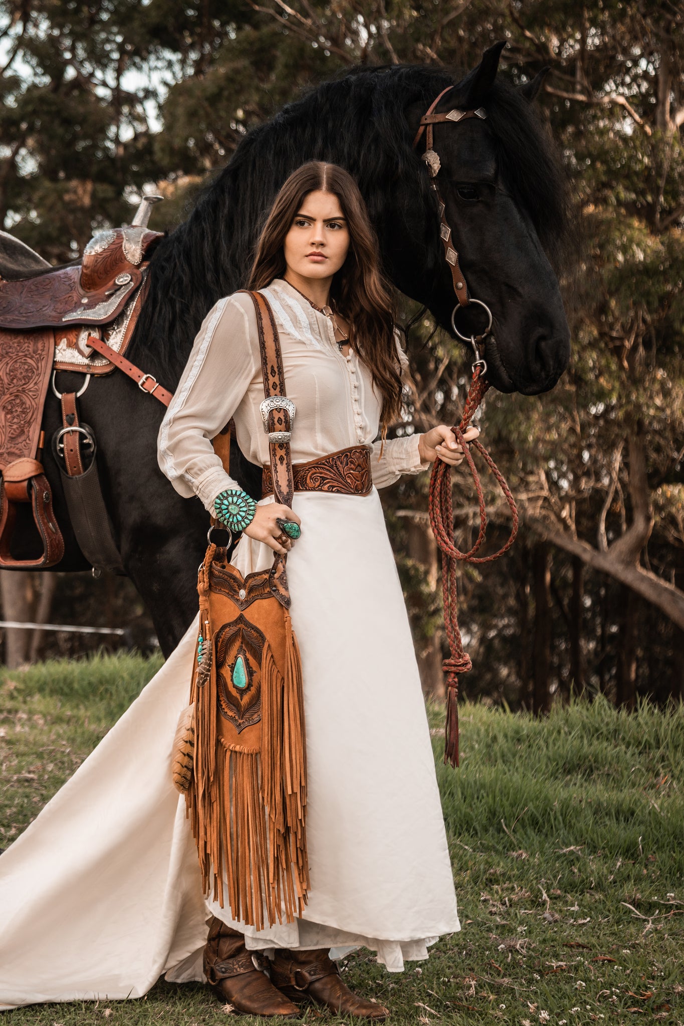 Friesian horse and girl wearing Buffalo Girl bag 