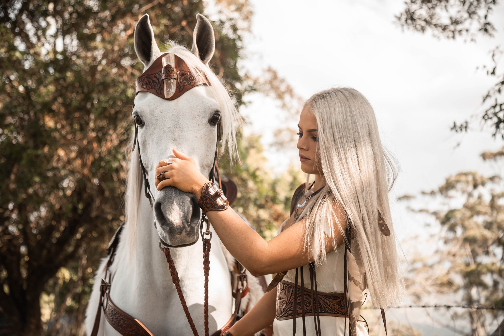 Blonde girl white horse