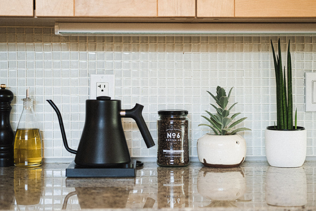 Coffee beans and equipment on counter