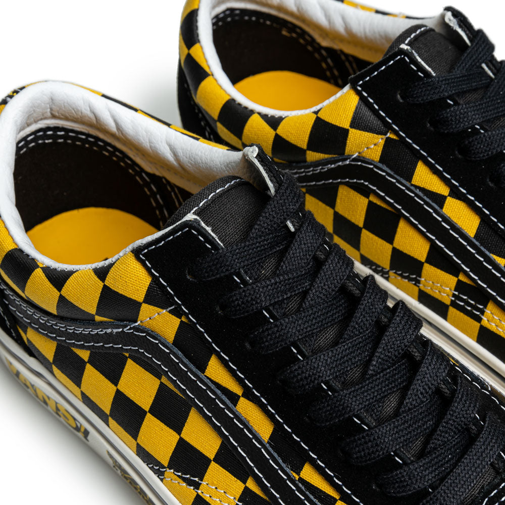 black and yellow checkered old skool vans