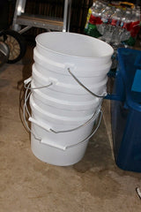 Stacked 5 Gallon Dubia Roach Frass sifting buckets