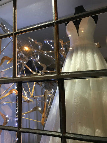 Festive window display at rachel scott Couture