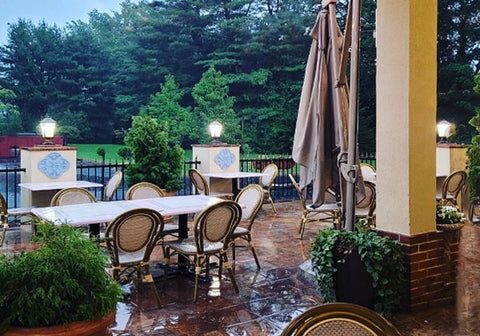 Outdoor brick patio with table and chairs