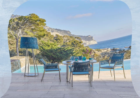 Blue chairs by pool