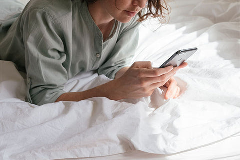 woman checking her cell phone