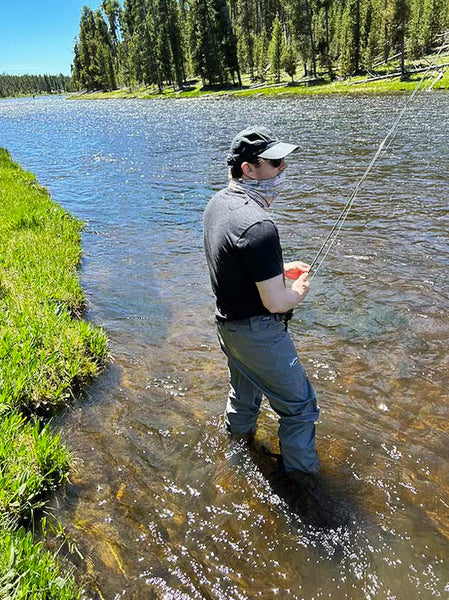 Mand fly fishing at Yellowstone National Park in the Madison River