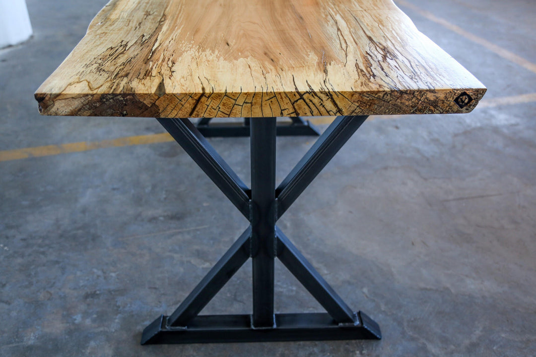 https://cdn.shopify.com/s/files/1/2470/7548/products/spalted_maple_trestle_dining_table.jpg?v=1513281880&width=1080