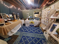 a mockup of my booth setup, staged in my basement.